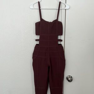 Wine colored Tic Toc Jumpsuit with accent lines!